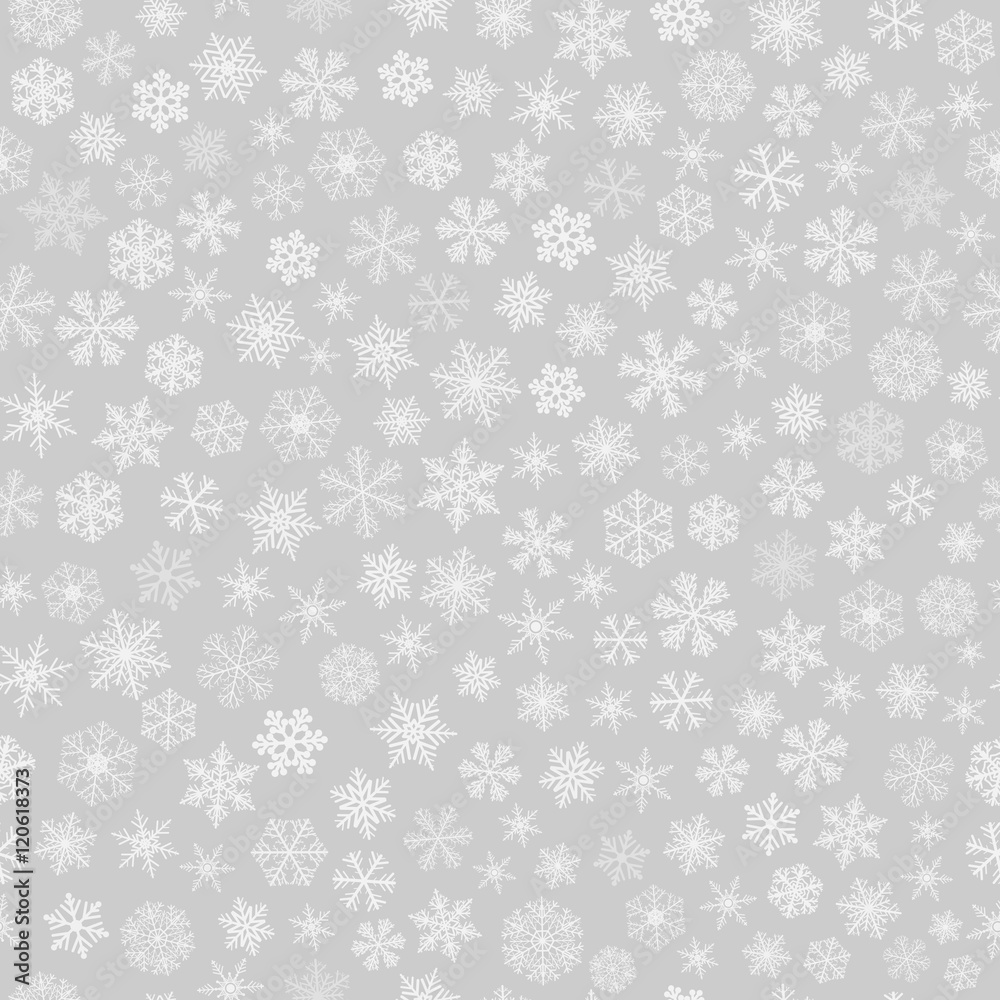 Seamless pattern of snowflakes, white on gray Seamless pattern of snowflakes, white on gray