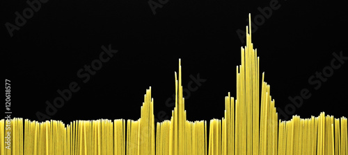 Spaghetti Laid Out In The Form Of The City. Space For Text. Black Background. Isolated. Top View.