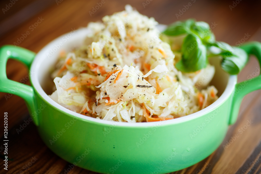 Sauerkraut with carrots in a bowl Sauerkraut with carrots in a bowl