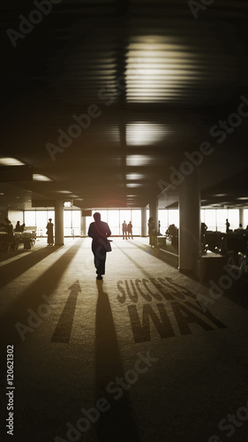 a man walking into the light,light and shadow,dark edges,light of life concept,shadow text success way and arrow,fight for better life