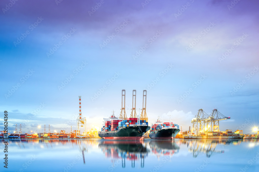 Logistics and transportation of International Container Cargo ship in a harbor with water reflections for logistic import export background and transport industry.