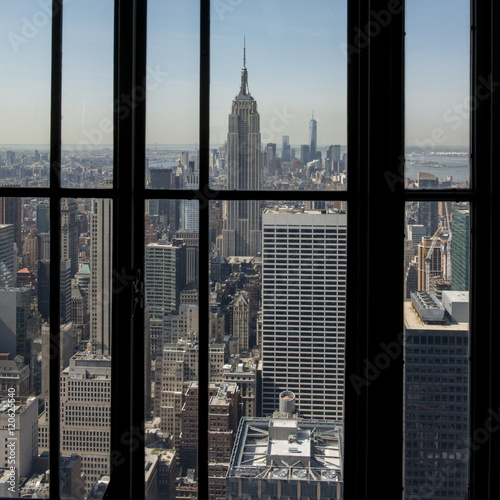 Looking out a window at the skyscrapers in Manhattan, New York City