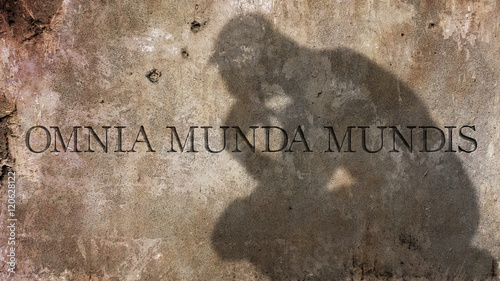 Omnia munda mundis. A Latin phrase meaning To the pure men, all things are pure. photo