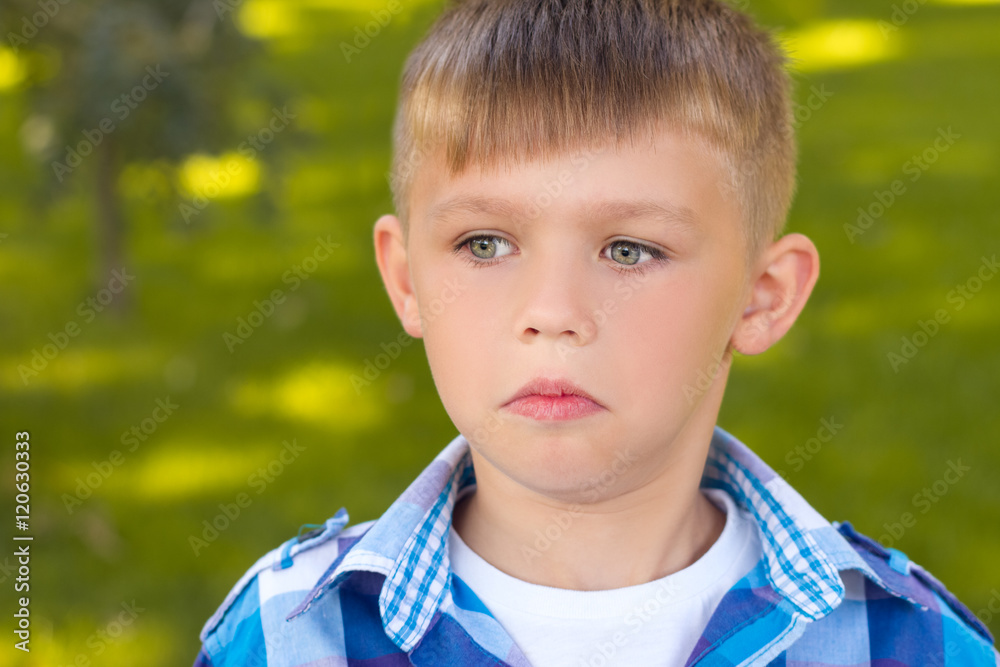 Portrait close . The frightened boy . Beautiful ,little boy . Portrait close . The frightened boy . Beautiful ,little boy .