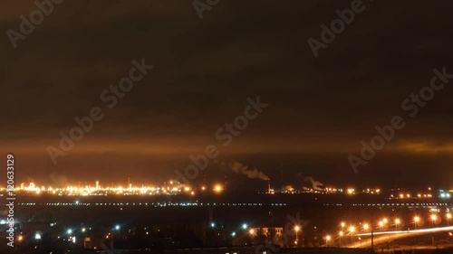 Outskirts industrial city at night photo