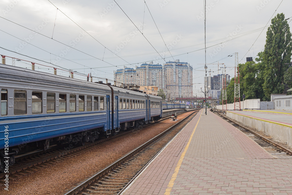 Fototapeta premium Wagons in a train station and an empty platform. Transport
