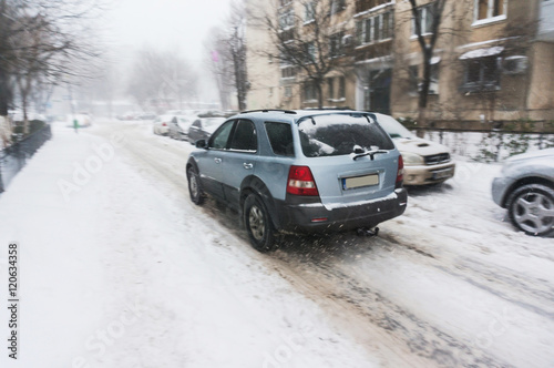 SUV on street in winter