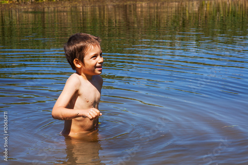  Boy bathing in river