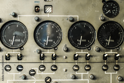 Retro 70's Aircraft cockpit dashboard control dials.