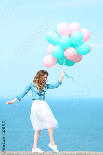 Beautiful young woman with ...