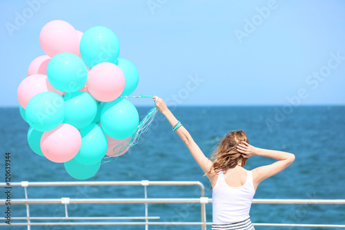 Beautiful young woman with ...