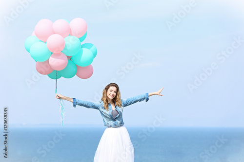 Beautiful young woman with ...