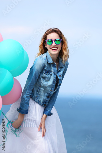 Beautiful young woman with ...