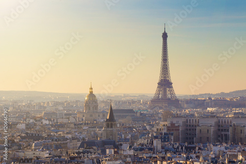 Aerial view of Paris with Eiffel tower and Invalides palace at dawn
