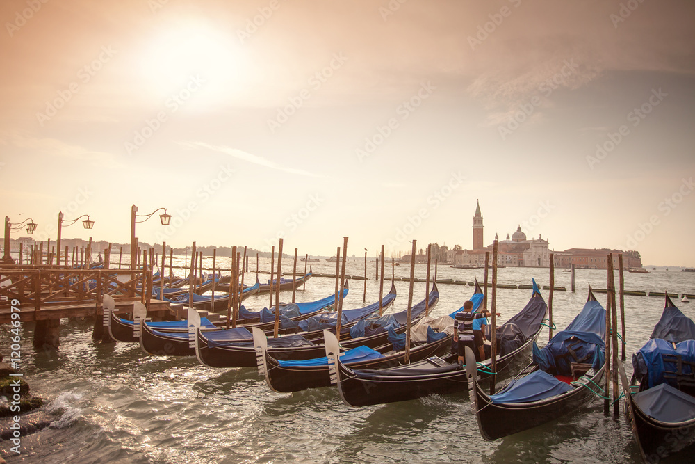 Gondolas parked at San Marco district at sunset