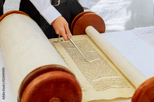 Jewish man dressed in ritual clothing  Torah at Bar Mitzvah 5 SEPTEMBER 2016 USA photo