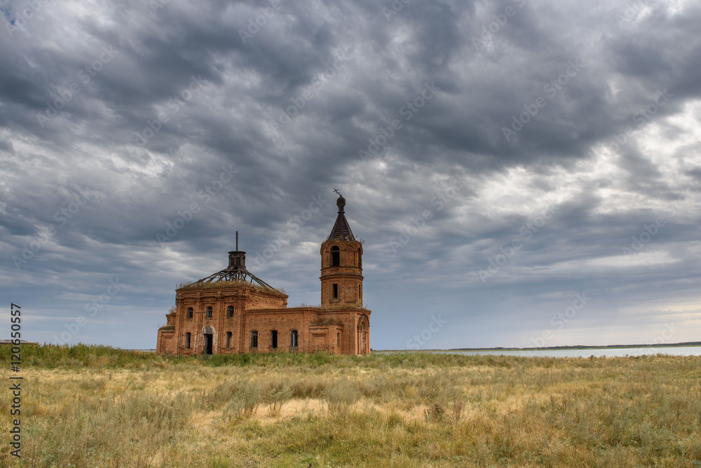 the ruins of a brick church in Russia
