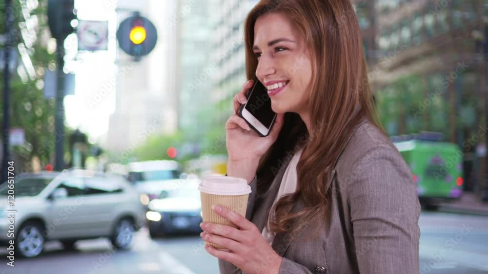 Sexy businesswoman talking on the phone. Happy and laughing pretty woman in 20s using smartphone. Sexy businesswoman talking on the phone. Happy and laughing pretty woman in 20s using smartphone.