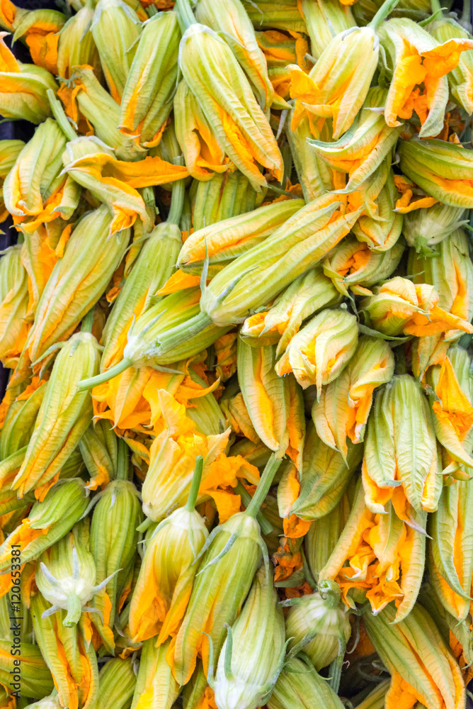Zucchini flowers for sale at a market in Palermo, Sicily Zucchini flowers for sale at a market in Palermo, Sicily