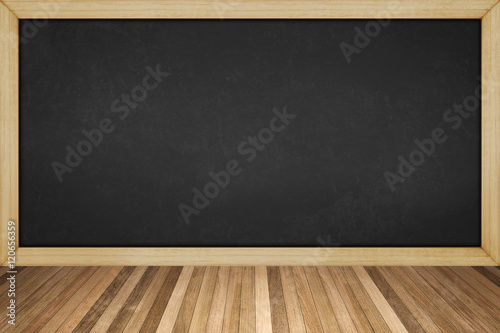 blackboard with wooden frame on wood floor , for background text