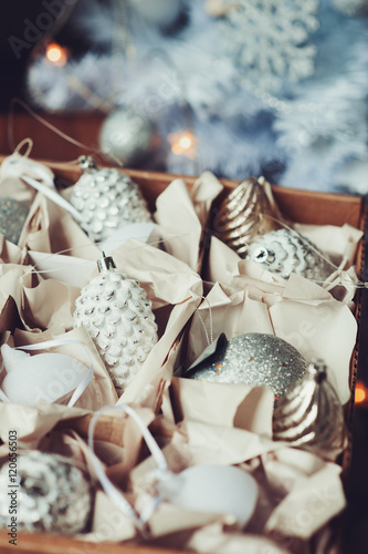 white and silver Christmas decorations in box, celebrating New Year 2017 at home