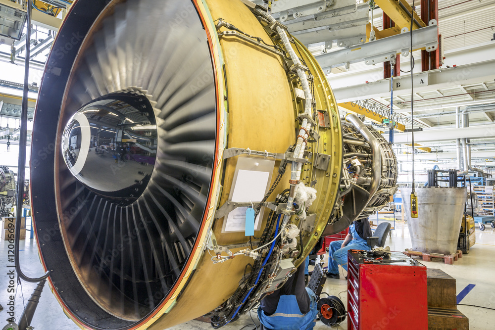 Obraz premium Big airplane engine during maintenance