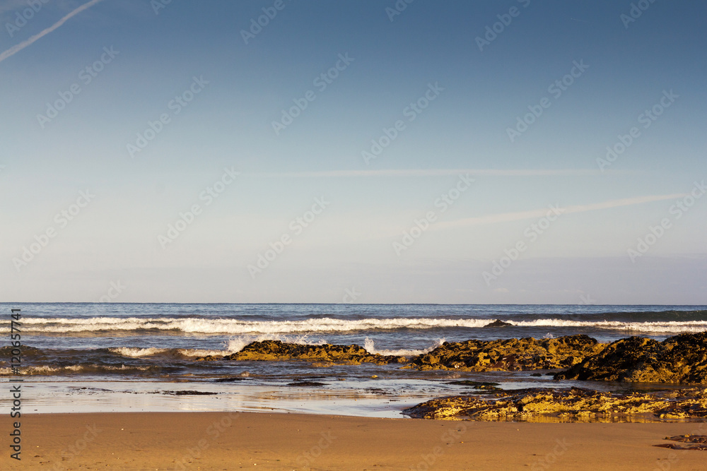 Waves on the beach at Polzeath in Cornwall Waves on the beach at Polzeath in Cornwall