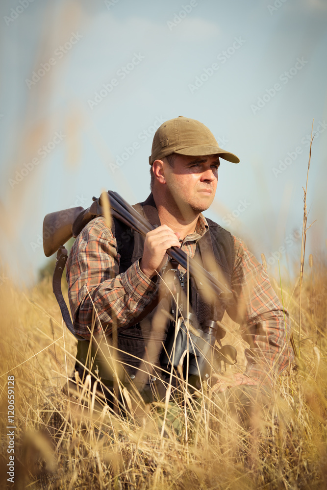 Hunter With Open Shotgun On Shoulder Hunter With Open Shotgun On Shoulder