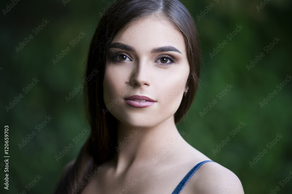 Close-up portrait of a beautiful young caucasian woman with clean skin, long hair and casual makeup Close-up portrait of a beautiful young caucasian woman with clean skin, long hair and casual makeup