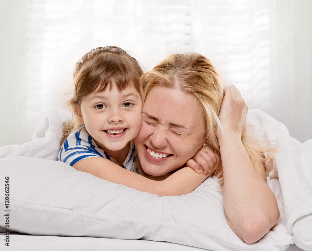 playing Mother and daughter playing Mother and daughter