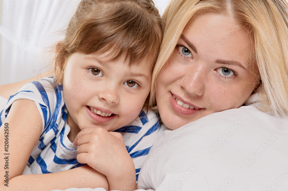 Mother and daughter closed portrait Mother and daughter closed portrait