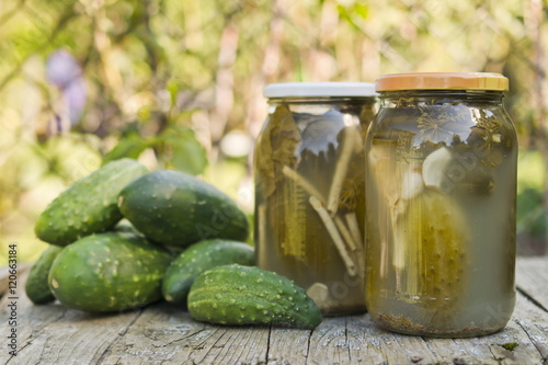 Preserving pickled cucumbers. Pickles jars.