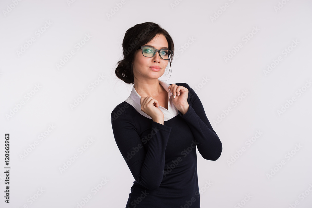 Secretary or business woman with suprised look on her face isolated over light background Secretary or business woman with suprised look on her face isolated over light background
