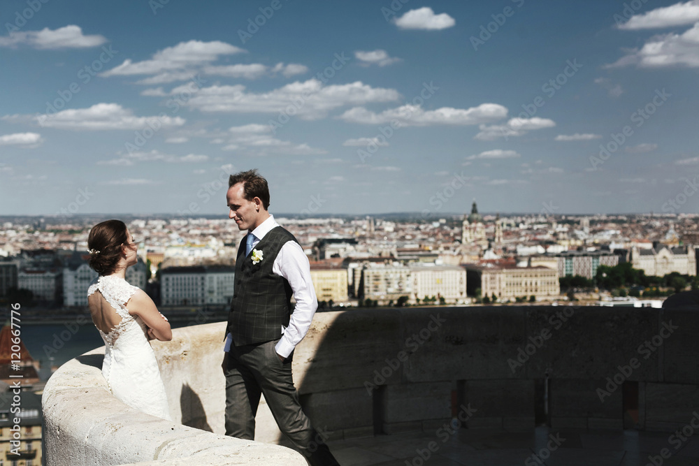 Happy newlyweds on the street