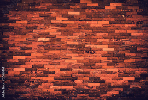 Texture of old grunge brick wall background. Vignette effect.