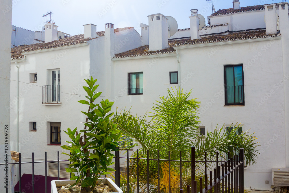 Fototapeta premium Pretty typical white houses Puerto Banus, Malaga Spain