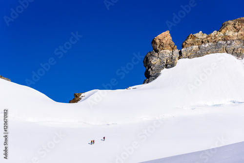 Ice Climbing on glacier in the mountains of Switzerland - Aletsch Glacier