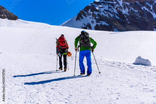 Ice Climbing on glacier in the mountains of Switzerland - Aletsch Glacier