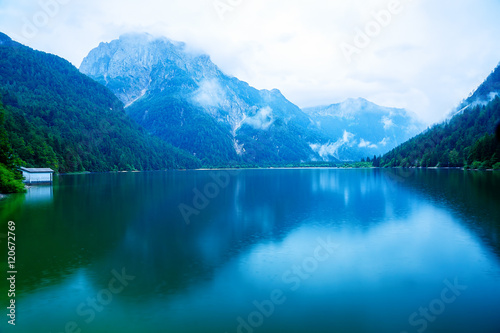 Beautiful landscape  lake with mountain in summer rain.