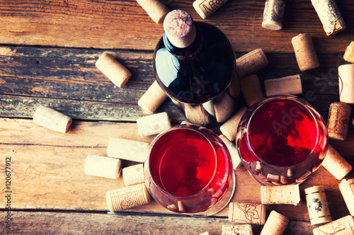 Wallpaper Mural Two glasses of red wine and corks. Copyspace. Top view Torontodigital.ca