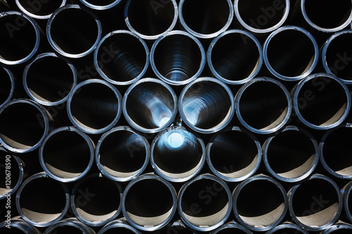 background of colorful big plastic pipes used at the building site.