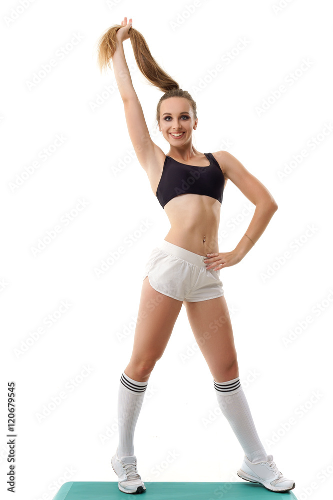 Concepts: healthy lifestyle, sport. Happy beautiful woman fitness trainer working out step aerobics isolated on white background Concepts: healthy lifestyle, sport. Happy beautiful woman fitness trainer working out step aerobics isolated on white background