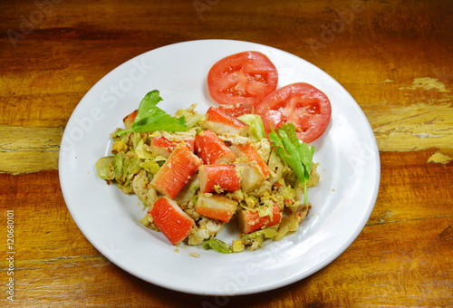 stir fried cabbage with crab stick and egg on dish