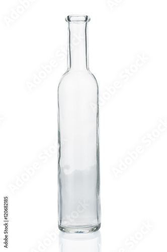 Empty glass bottle closeup on white background