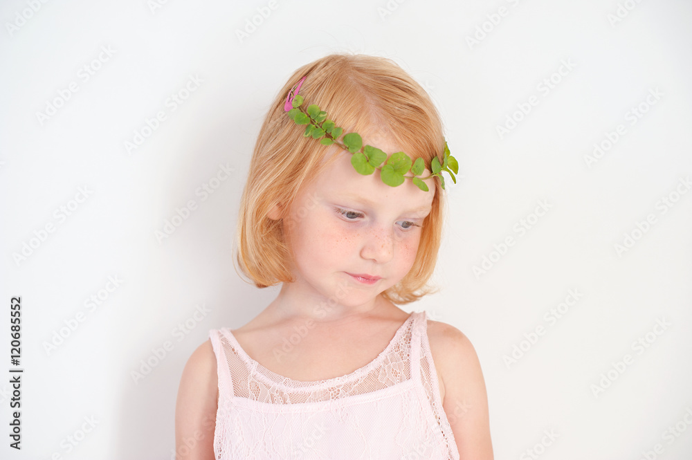 Redhead little girl is sad with copy space Redhead little girl is sad with copy space