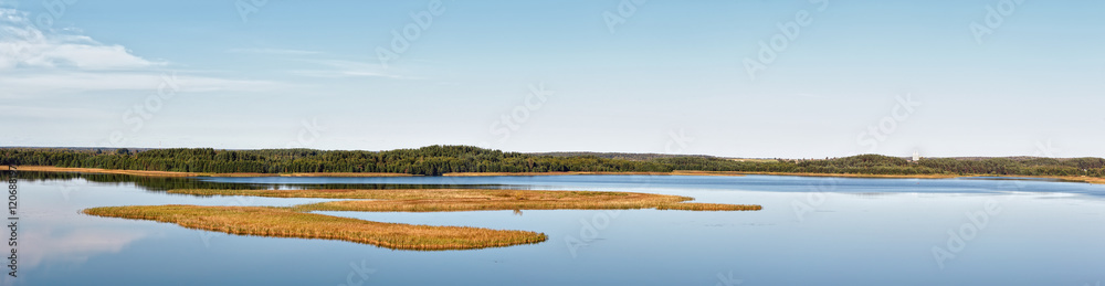 Panoramic view of the lake in summer day.