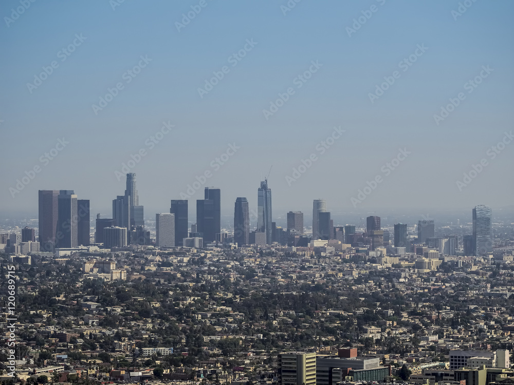 View of the downtown Los Angeles skyline at afternoon, from Griffith Observatory, in Griffith Park, Los Angeles, California.