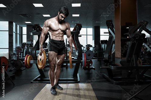 Canvas Print Muscular athletic bodybuilder fitness model