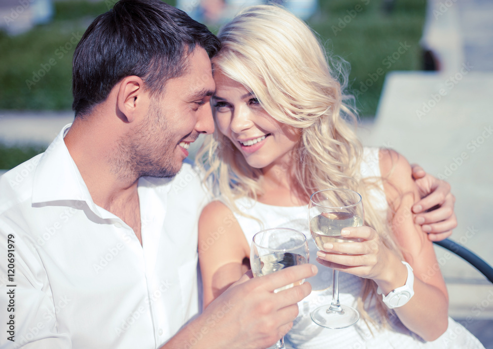 couple drinking wine in cafe couple drinking wine in cafe