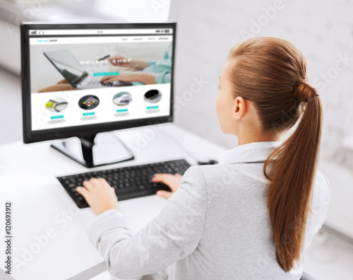 businesswoman with online shop on office computer